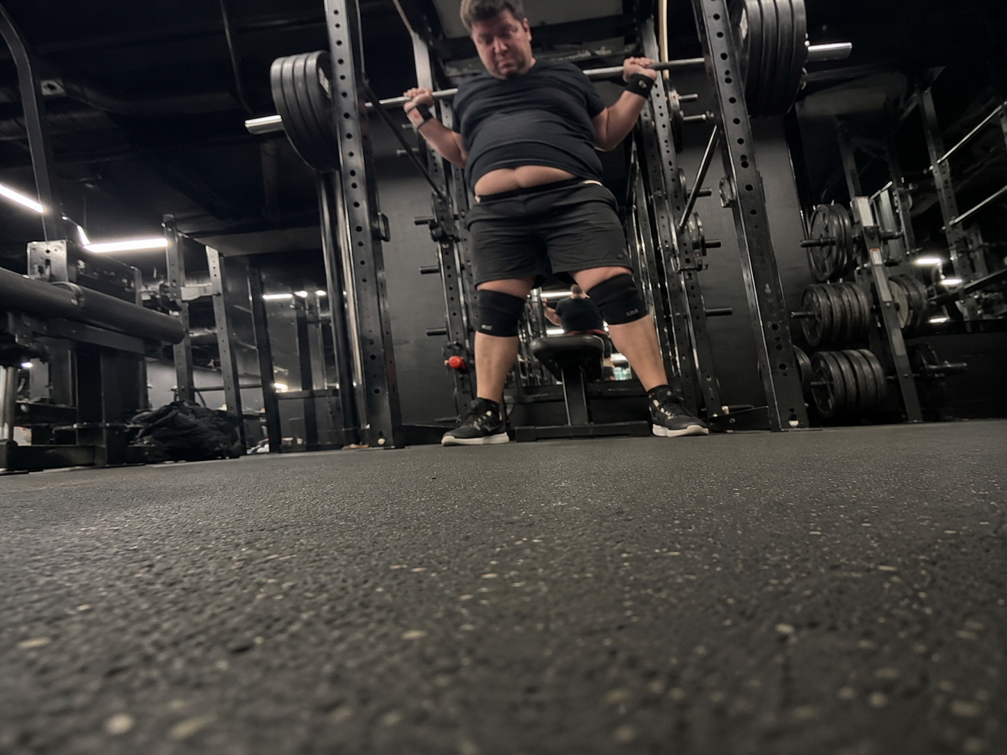 Bad low-angle phone footage from the gym floor